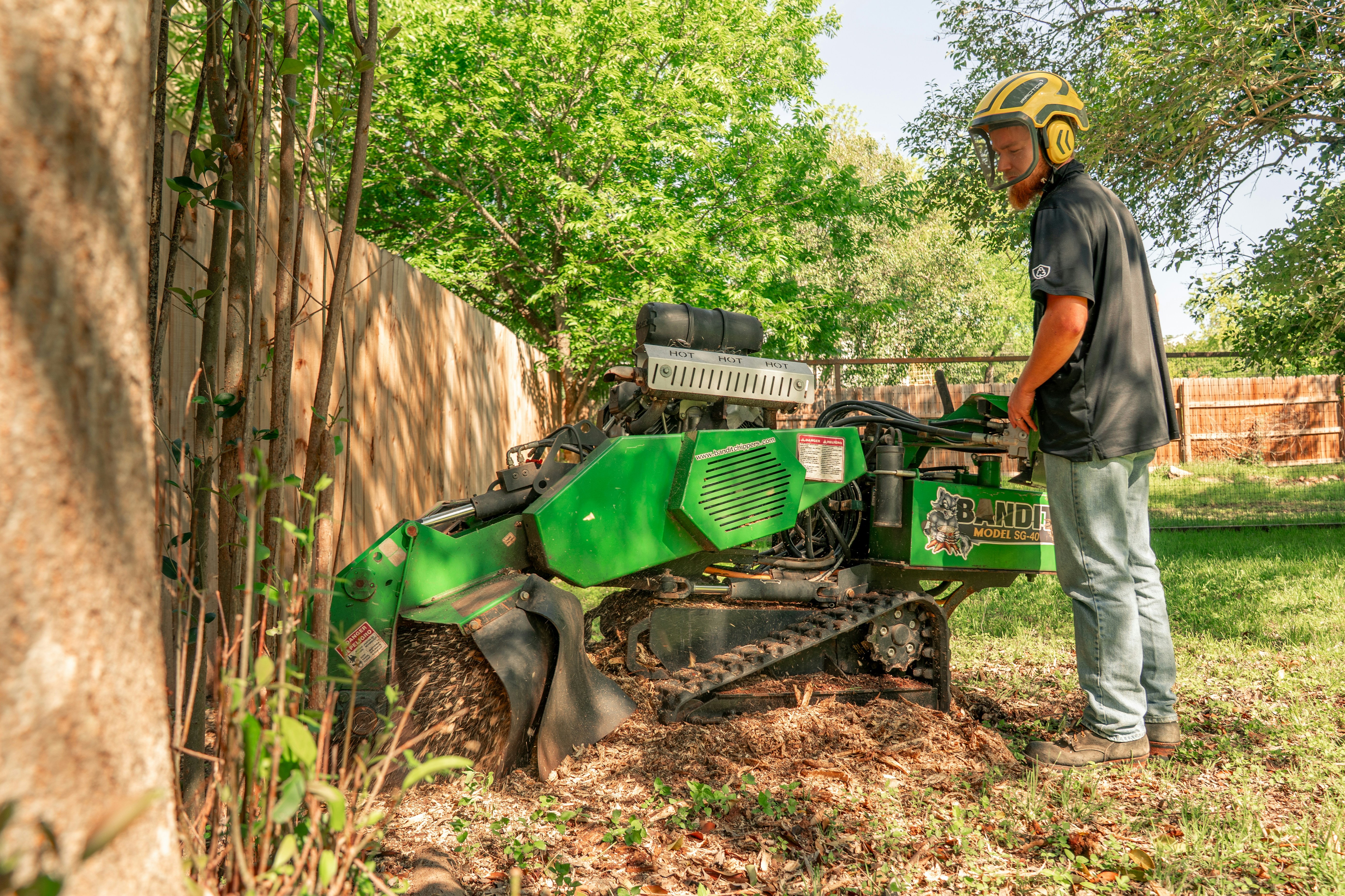 Professional stump grinding machine in action